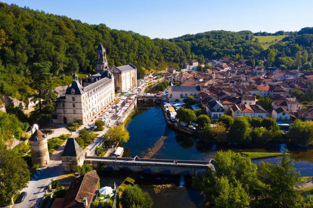Drone view of Brantome en Perigord on Dronne river in summer, France